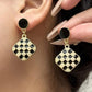 Elegant Black & Gold Checkered Drop Earrings